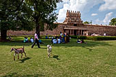 The great Chola temples of Tamil Nadu - The Airavatesvara temple of Darasuram. View of the gopura from outside the temple walls